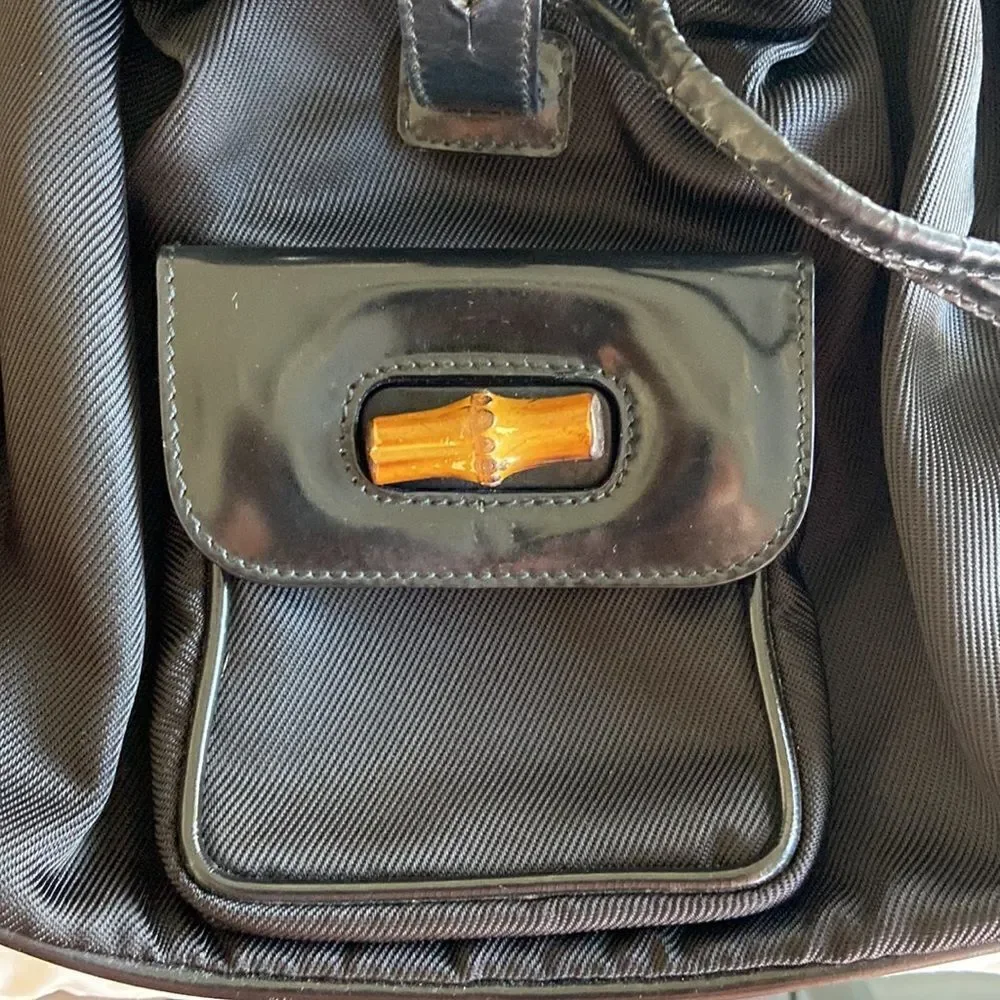Gucci tassel oval mini backpack bambu Black impressive condition original dustba